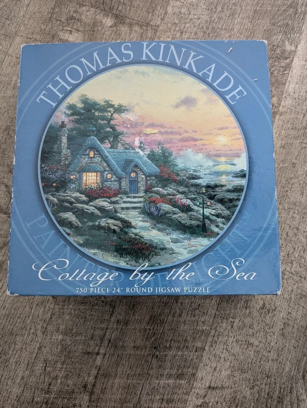 Thomas Kinkade Cottage by the Sea 750pc Round Puzzle